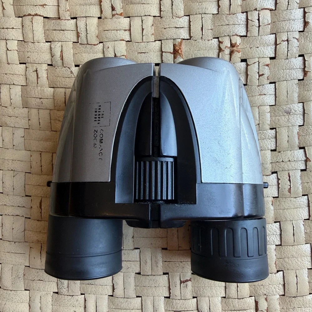 Compact Silver and Black Binoculars Sharper Image